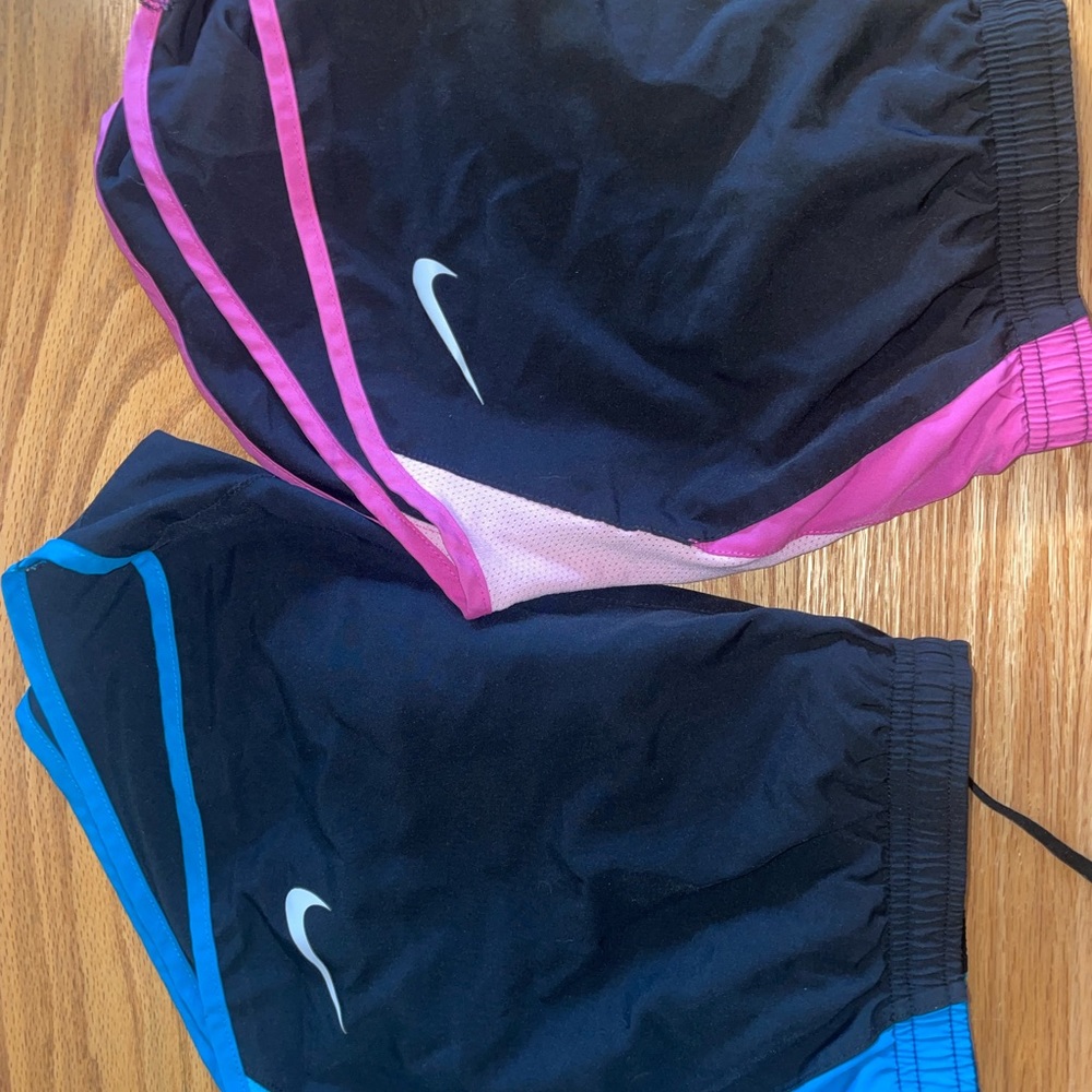 Two pair of black Nike shorts